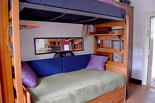A lofted bed and daybed are provided