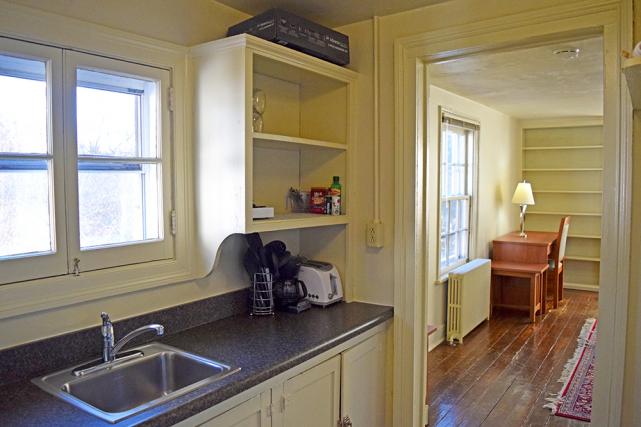 Kitchen includes countertop appliances and ample storage
