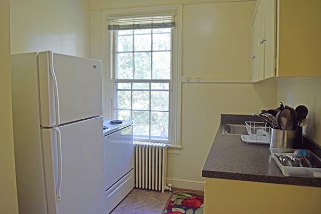 Kitchen with refrigerator and stove