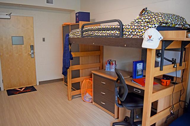 Renovated rooms include lofted beds, dressers, and desks