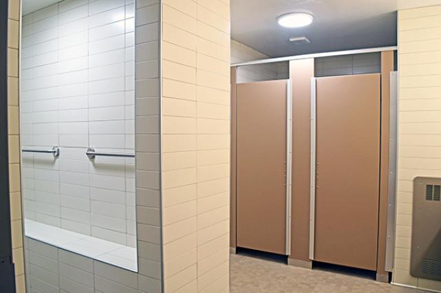 Shower room and stalls in Alderman Road suite bathroom