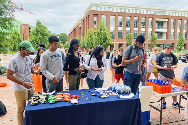 Second-year residents picking up bike safety information and giveaways