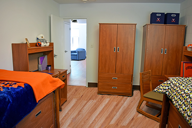 Bedrooms include desks, chairs, dressers, and wardrobes