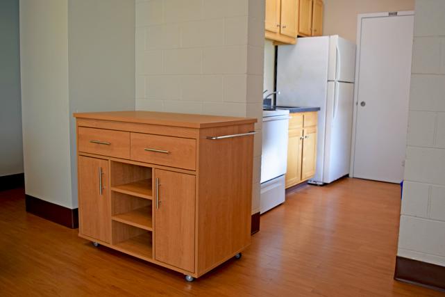 Kitchens in three-bedroom apartments include a movable kitchen island