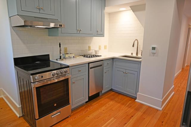 Kitchen includes stove, oven, dishwasher and single bowl sink