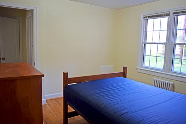 Furnished apartments include a 5-drawer dresser in bedroom with a double bed